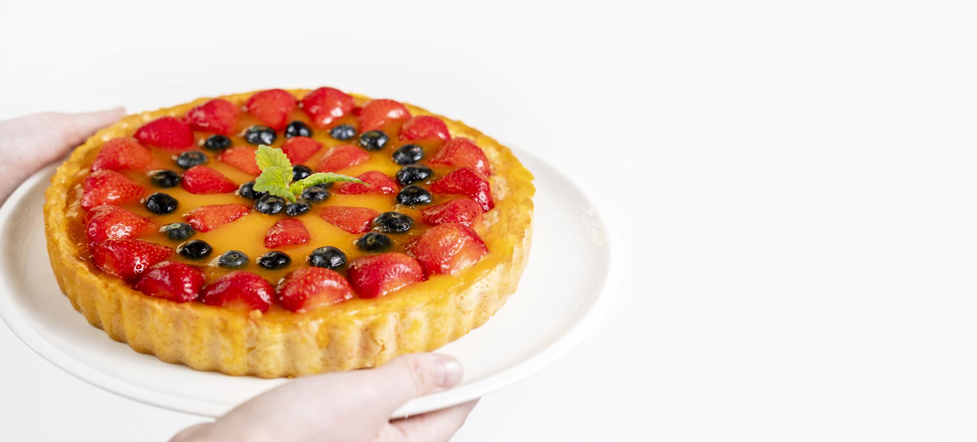Close-up of caramelized vegetable tart with modern plating